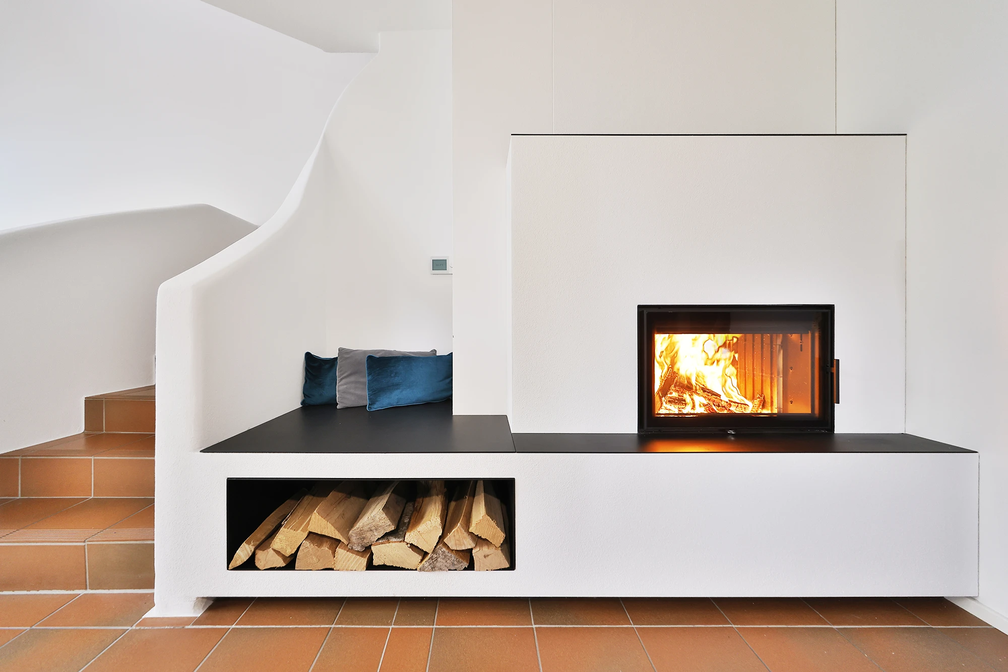 kachelofen münchen mit Holzfach